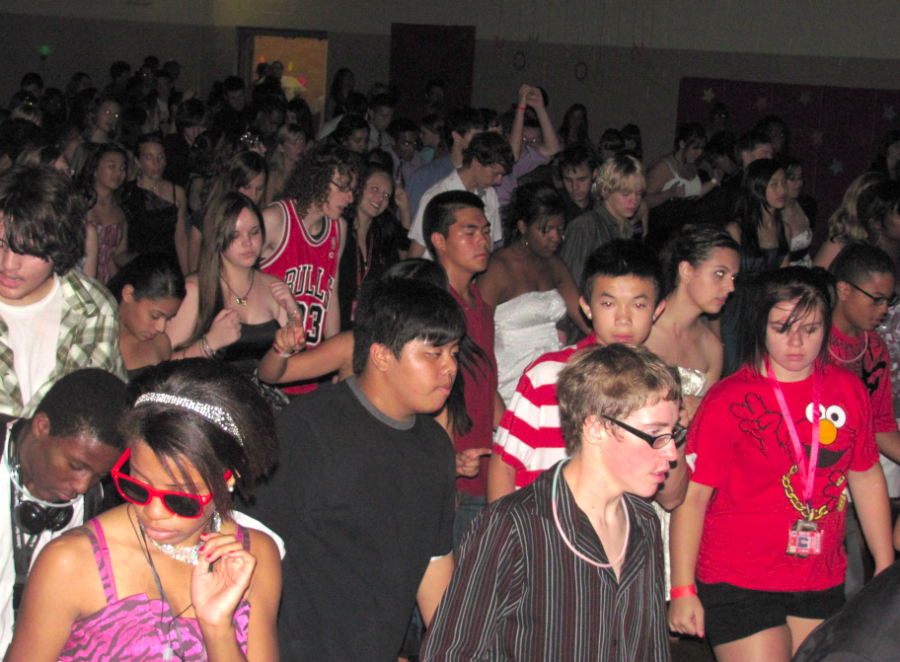 Students dance the night away at this years Homecoming Dance in the South Gym on Friday, Sept. 9, 2011. The theme for this years Homecoming was 
