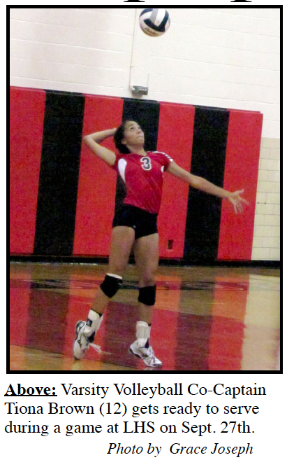Above: Varsity Volleyball Co-Captain Tiona Brown (12) gets ready to serve during a game at LHS on Sept. 27th.