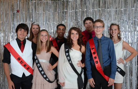 The 2013 Homecoming Royalty winners pose for a photo during the dance in the South Gym on Friday, October 12, 2012. (Back Row, Left to Right) Princess: Allison Holt, Prince: Landon Beard, King: D.J. Castillo, Queen: Emily Gasper. (Front Row, Left to Right) Duke: Blake Costello, Duchess: Cassidy Taladay, Lady: Rebecca Haug, Lord: Caleb Martin. Photo Courtesy of Andrew Carlson at lincolndigitalprints.com. 