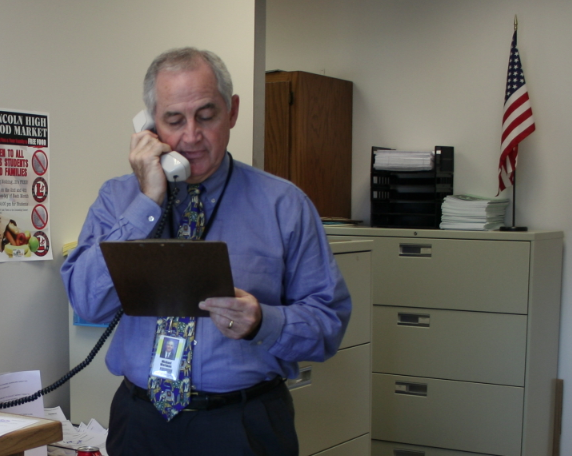 LHS Principal Mike Wortman reads a Veterans Day address during Sound Announcements on Monday, November 12, 2012. 