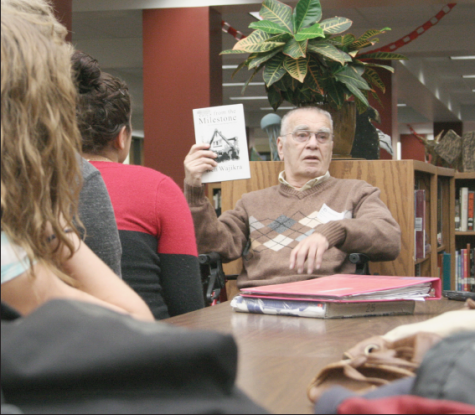 Holocaust Survivor Lou Leviticus gives advice and tells his story to Terry Keefe’s Holocaust Literature class in
the Media Center on Nov. 7, 2012. He explains what it was like to avoid being captured, his separation from his parents, and the hard times he went through on the run. Photo by Katie Chiplaski
