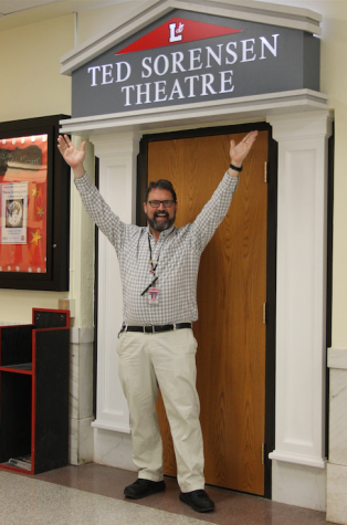 IB coordinator John Heineman poses in front of the
Ted Sorensen Theatre at Lincoln High School.
Photo by Samantha Stuefer