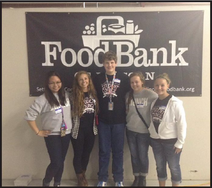 LHS StuCo members pose for a picture after bringing the food to the Lincoln Food Bank. Left to Right: Riana Duzon (10) Cassidy Talady (12) Nathan Versaw (9), Kaylee Robinson (11), Kylie Gropp (9). Photo courtesy of Niki Barnes