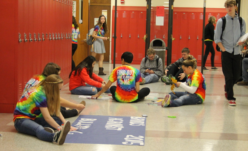 Student Council members put the finishing touches on some signs advertising tonights Bands Against Bullying event to raise awareness about bullying. The show will be in the Ted Sorensen Theatre at 7 p.m. and is free. 