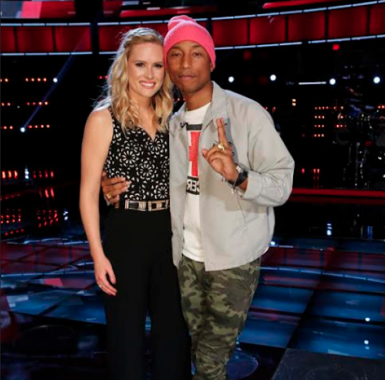 Hannah Huston, one of the last nine contestants remaining in The Voice poses for a picture with her coach, Pharrell Williams. Photo courtesy, NBC.