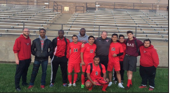 Seniors at Lincoln High Soccer team with their coaching staff posing to a picture after the season is over. Photo by fan.