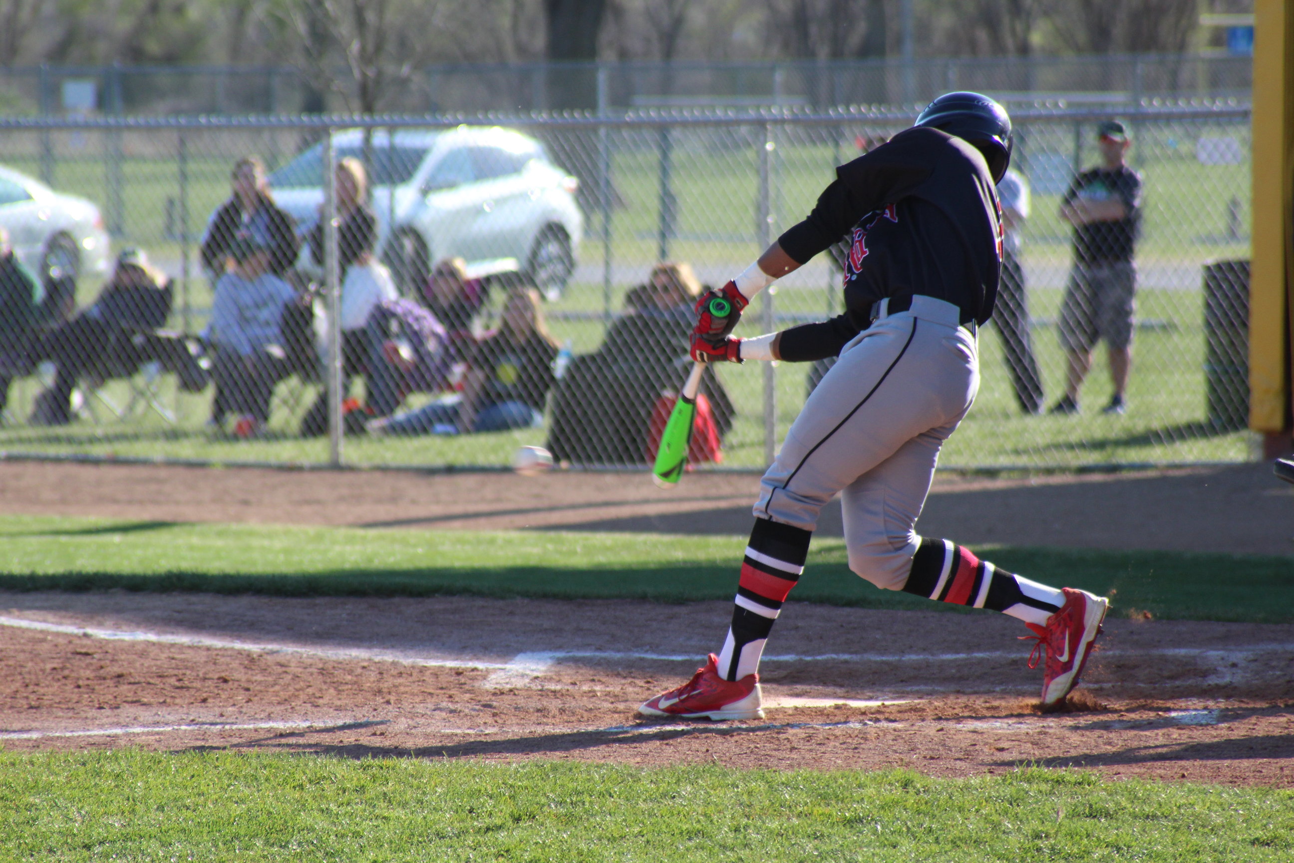 Hitting for the Fences: New baseball coach leads the Varsity Links through the season, builds foundation for years to come.