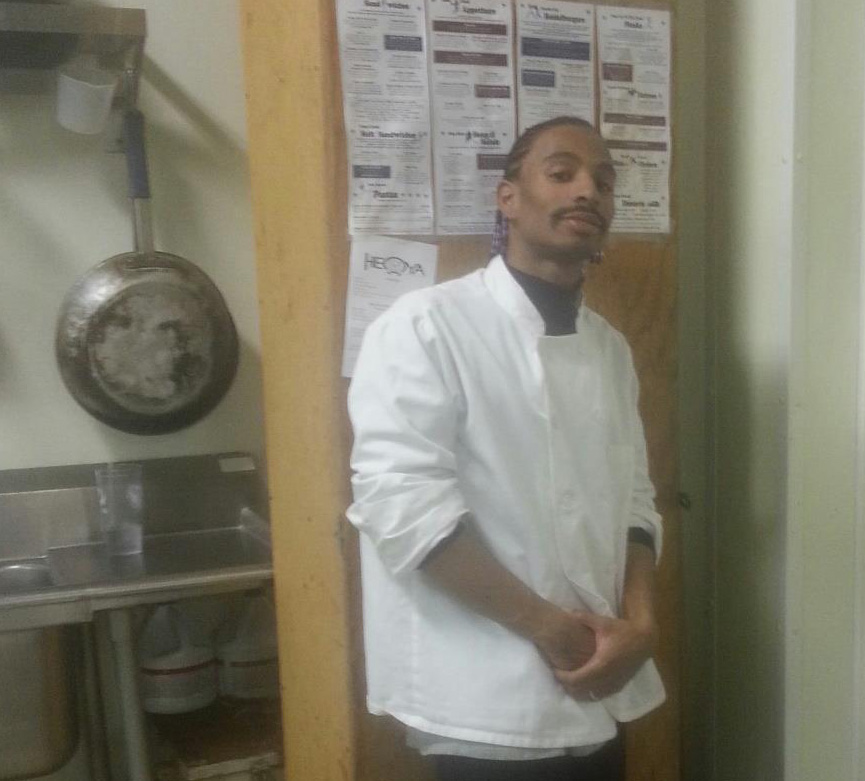 George Weaver, LHS alum (’04) and owner of Granny Weavs Soulfood Catering poses in the kitchen of his business. Photo Courtesy of George Weaver 