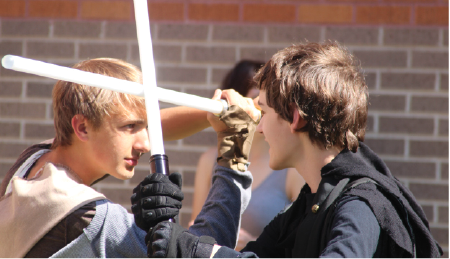 Above, Carl Shack (10) and Anthony Lacy (10) practice their duel for Star Wars club for Festivus. Photo courtesy of Carson Allen 