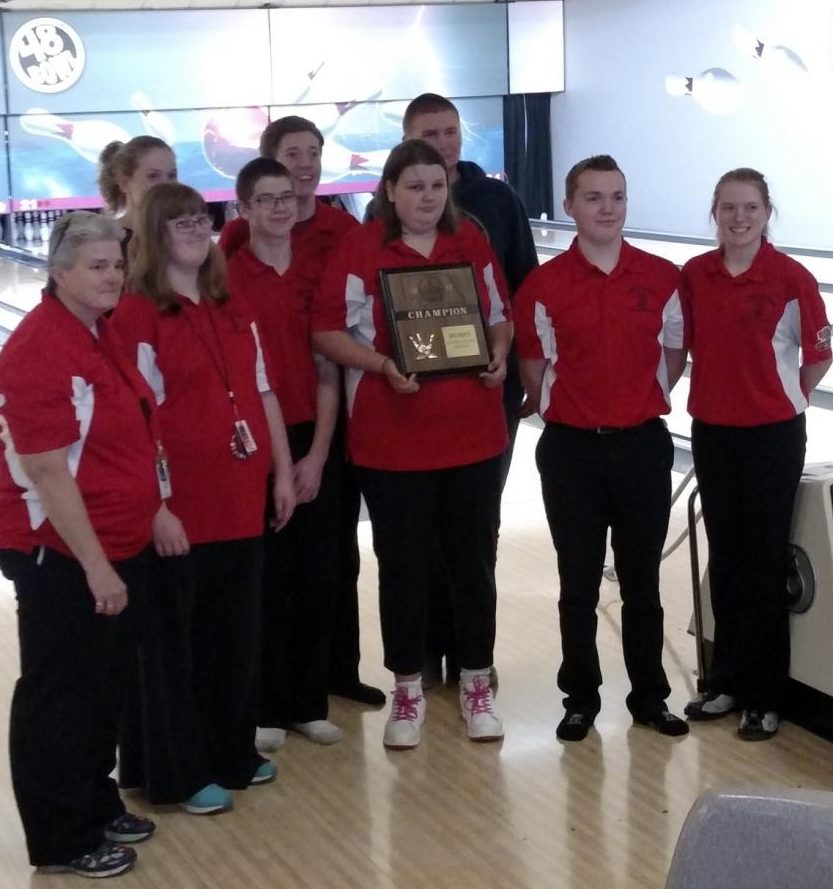 The LHS Unified Bowling Team poses with their District trophy on Tuesday, Nov. 28, 2017. The team will advance to the finals next week. Photo courtesy of Lisa Thiessen