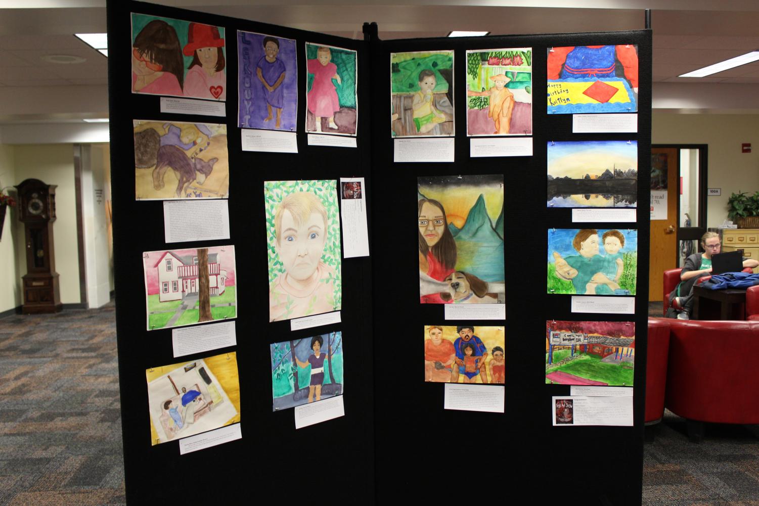 Student artwork hangs on display in the Media Center this week through December 15, 2017 as part of the Art Department’s Fall Art show. Photo by Daniel Do
