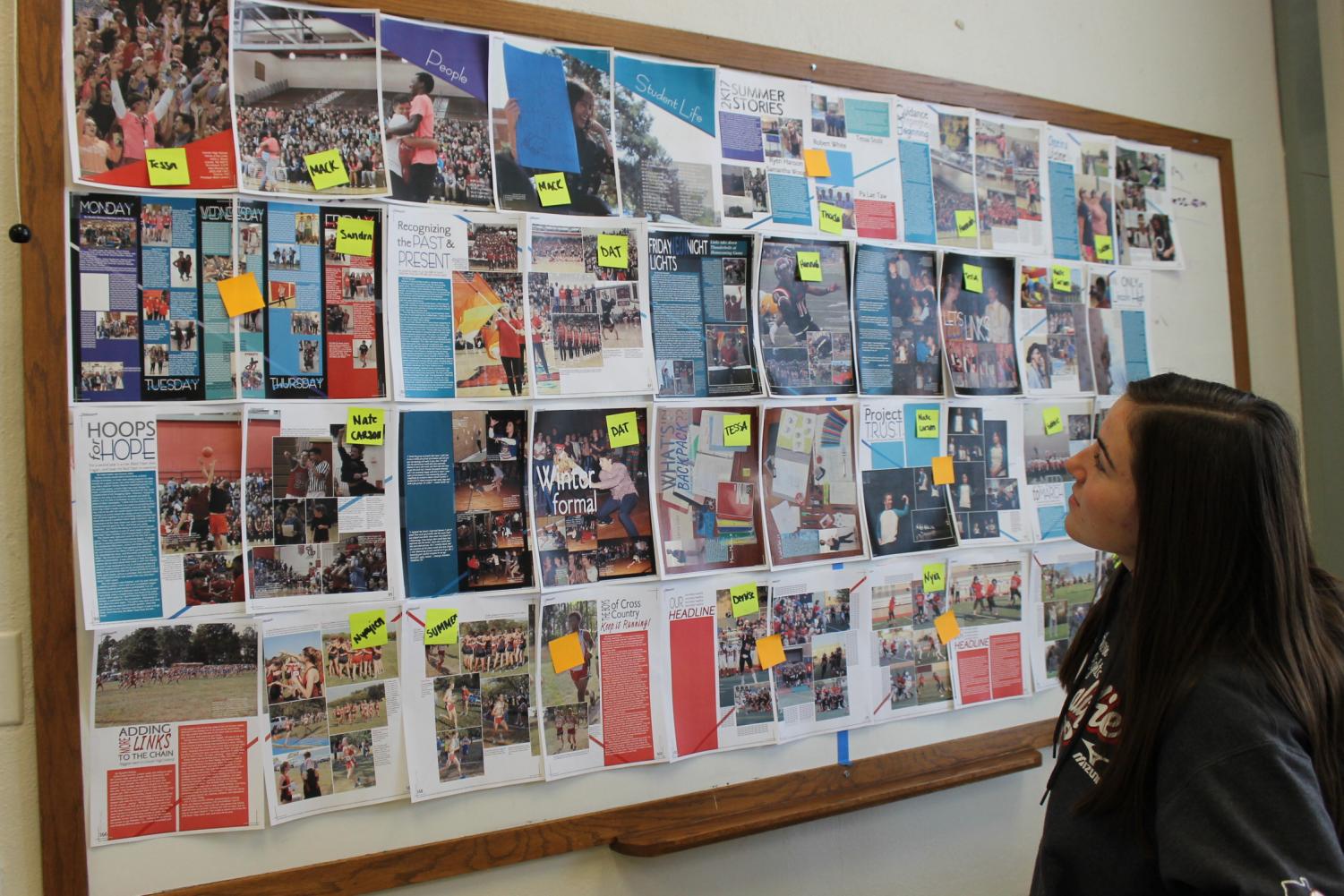 Mackenzie Pierson (12), LHS Yearbook editor-in-chief, scans the Yearbook spread on a Saturday work day on Dec. 16, 2017. The yearbook staff came to work on their spreads to make sure they were finished before the deadlines. Photo by Tessa Wiser.