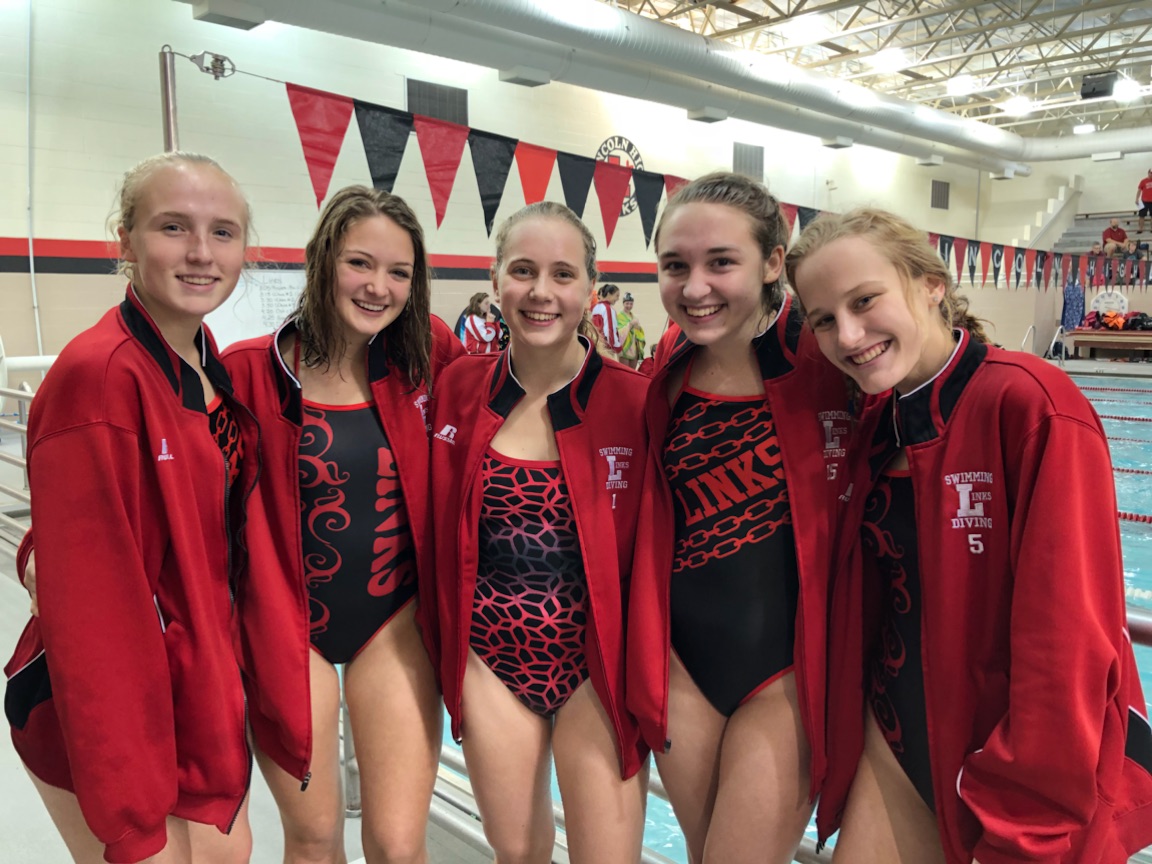 Johanna Schubert (center) poses with some of her fellow team members. From left to right Adrian Vavala (10), Emily Smith (11), Johanna Schubert (11), Nella Maynard (10), and Colleen Arnold (11). Photo courtesy of Johanna Schubert