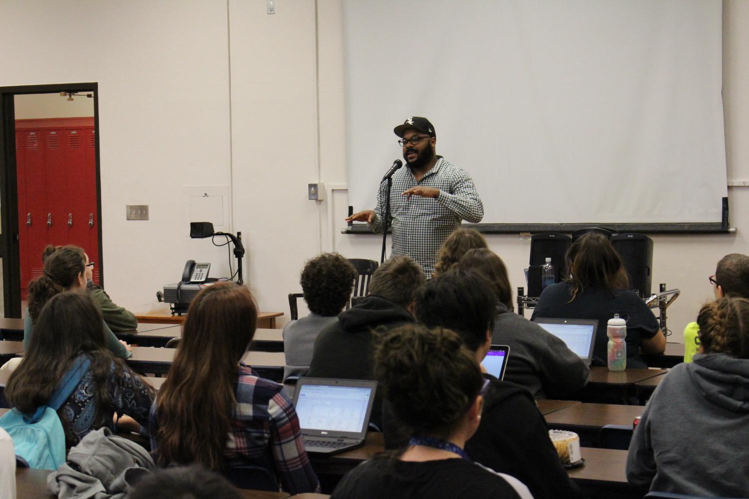 Nate Marshall, Director of National Programs for “Louder Than a Bomb” slam poetry festival, speaks to Lincoln High students after school on Friday, Jan. 19 in Room 300. Marshall shared his experiences about the festival, read some of his poetry, and answered the students’ questions.