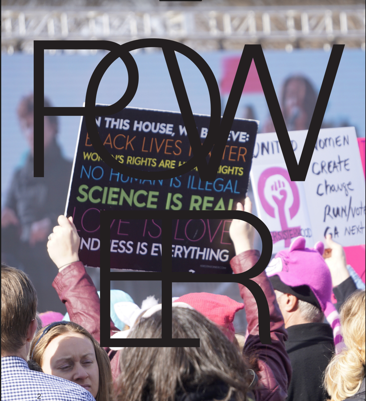 Members of the Women's March in Washington D.C. hold up signs on Saturday, January 20th, 2018. Photo courtesy of Lori Rennings.