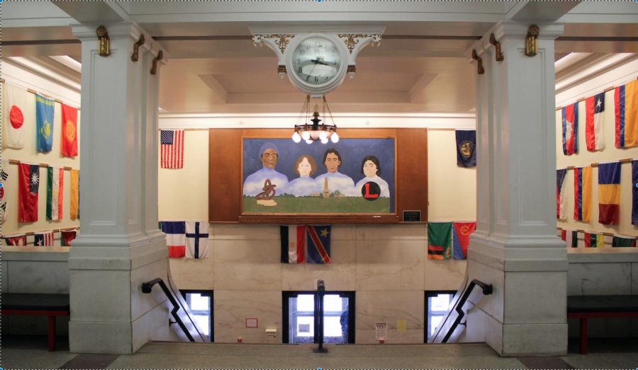 The entrance of Lincoln High School features flags and a mural that represent the schools diversity. Photo by Sara Balter.