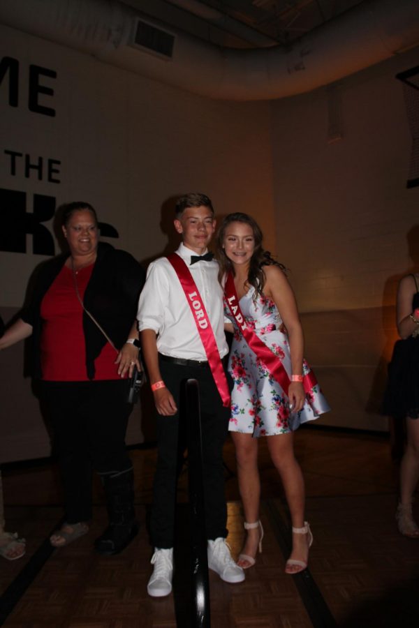 Lady Bayla Young (9) and Lord Caden Connelly (9) pose for a picture after winning ninth grade Homecoming royalty.