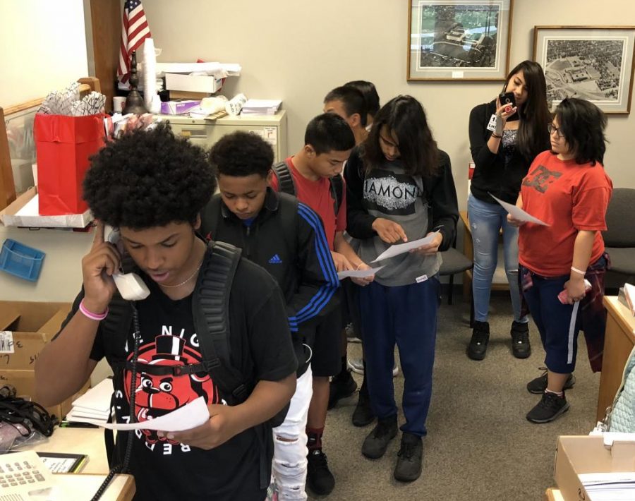 Native American Caucus students prepare to read over sound announcements regarding Columbus Day during the 1st week of October. 