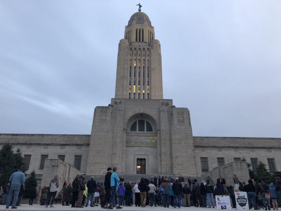 A crowd begins to form in front of the State Capitol before the vigil on Thursday, November 1, 2018. Photo by Meg Boedeker.