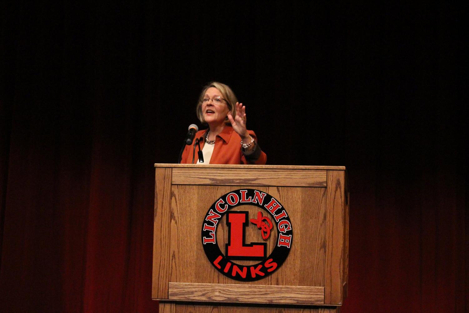 Jane Raybould, Democratic Senate candidate, speaks to Lincoln High students in the Ted Sorensen Theatre on October 30th, 2018 about her platforms. Raybould also answered questions submitted by Social Studies teacher Carol Flora's third period Civics class. Photo by Angel Tran