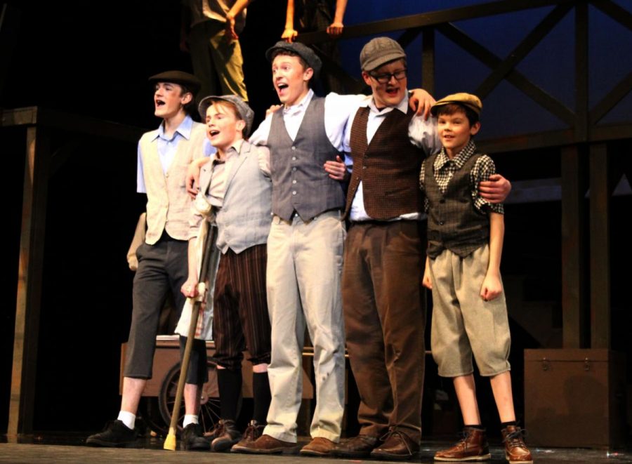 (Left to right) Carl Shack (11), Jackson Mikkelsen (12), Jacob Vanderford (11), Jack Amen (10) and Ryan Ostrander (5) sing Seize the Day during dress rehearsal on February 21st, 2019. Photo by Zeke Williams