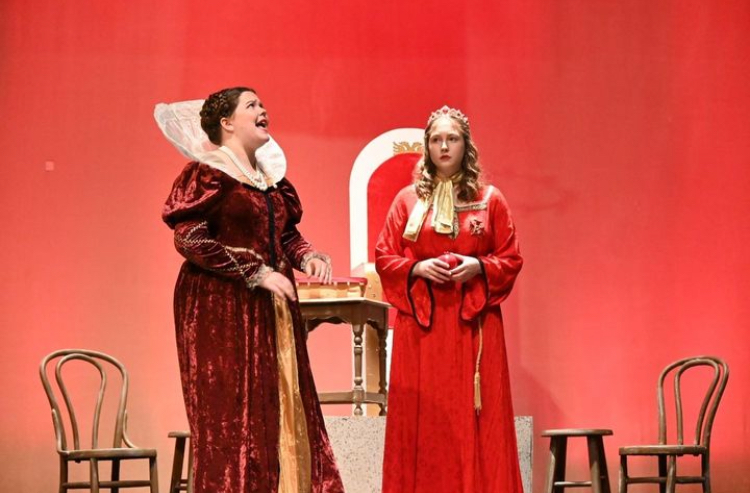 On left, Lucy Coke as Count Mountjoy, on right, Soren Vesely as Queen Gloriana in The Mouse That Roared Production.