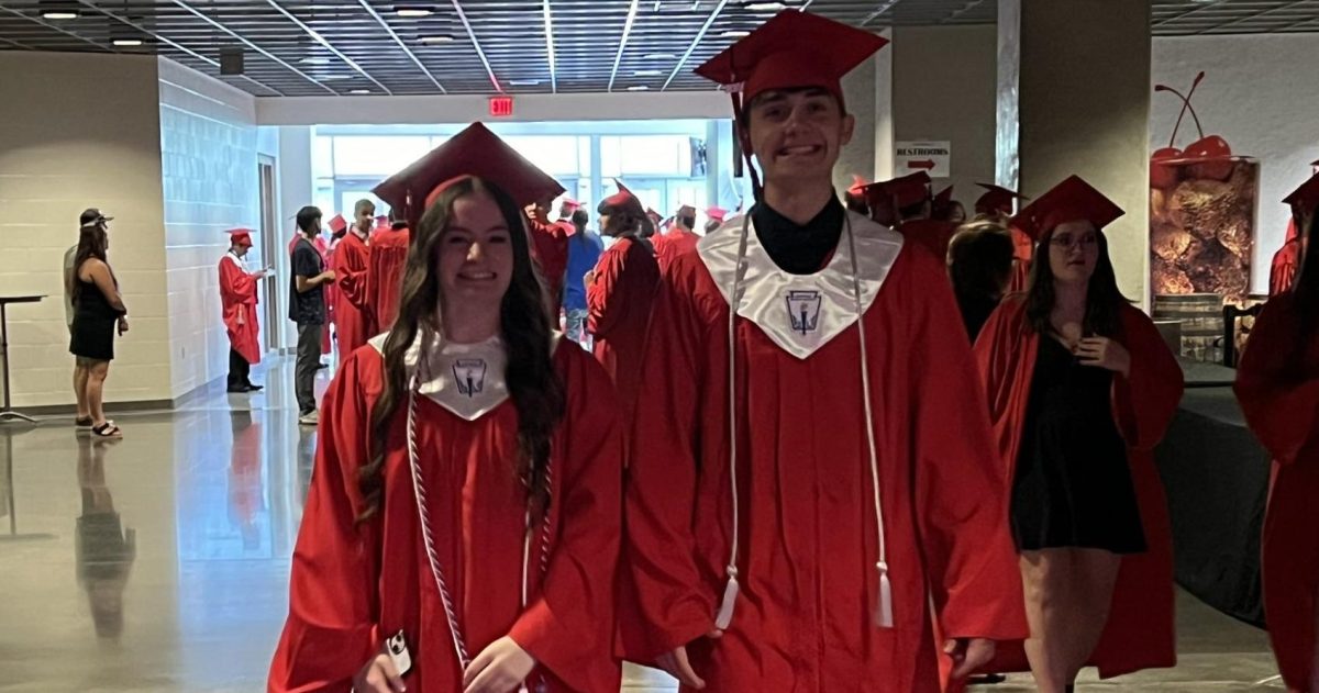Seniors Scarlett Coleman (left) and Conor Willeke (center) along with Adeliya Ivaniv (right back) arrive at Pinnacle Bank Arena on Saturday for 2024 Lincoln High School Commencement Ceremonies