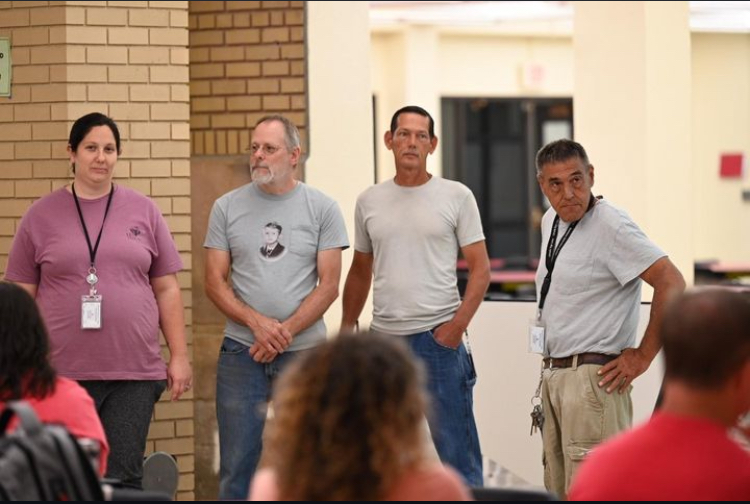 LHS's custodial staff receiving their award on August 8th.